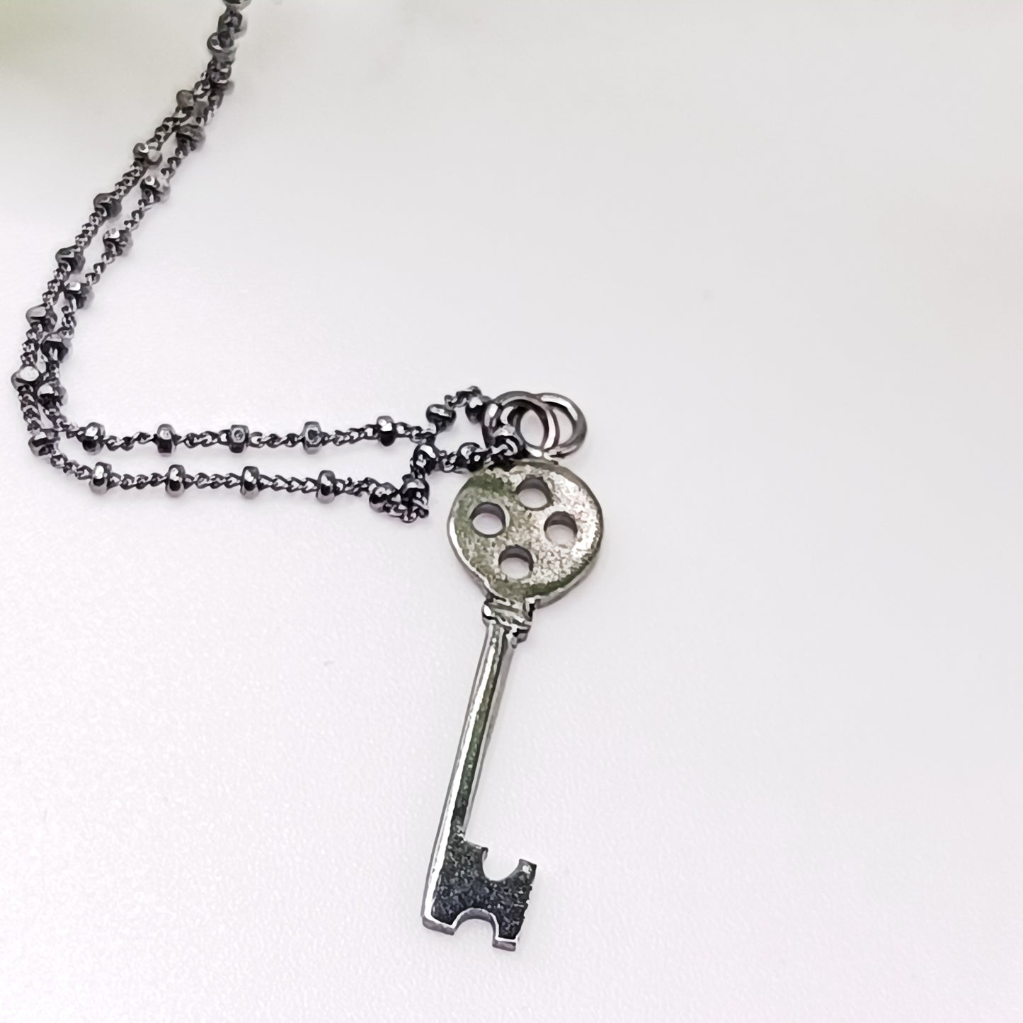 Llave Botón Plata de Ley